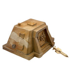 Gold-toned metallic bunker-shaped model with gear detail and side spear accessory.