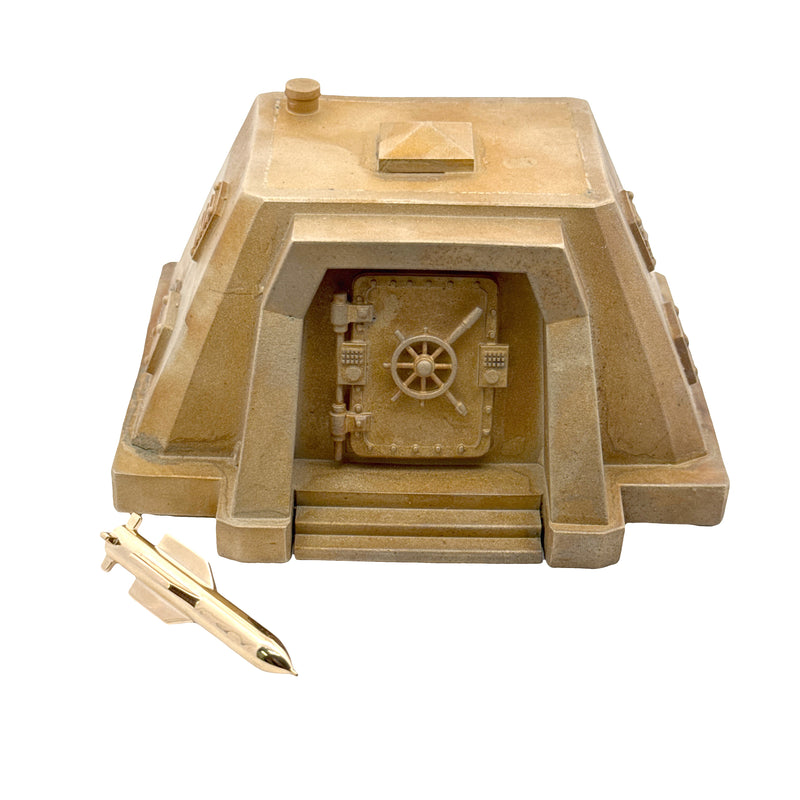 Gold bunker-shaped custom set with secure vault door and pen accessory.