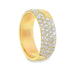Wide gold wedding band with three rows of small sparkling diamonds, textured edges.
