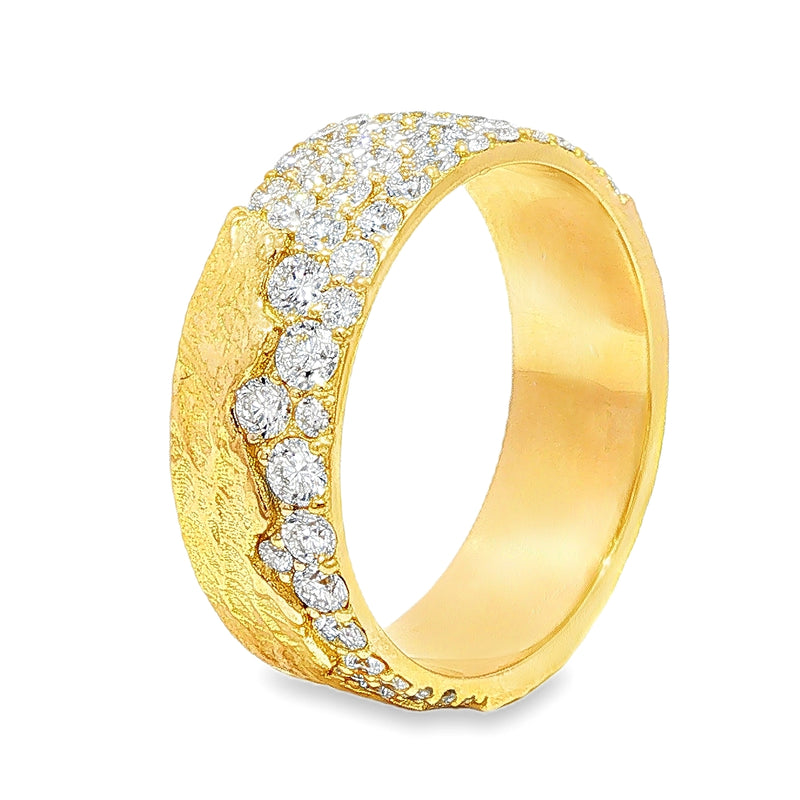 Wide gold wedding band with textured finish and two rows of sparkling round diamonds.
