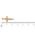 Gold crucifix pendant with detailed Jesus figure and ornate edges, about 1.75 inches long.