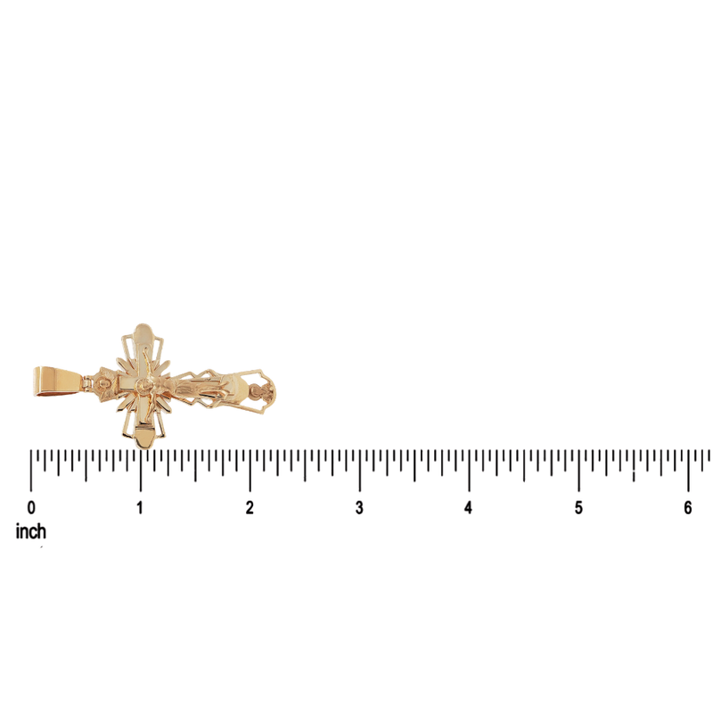 Gold crucifix pendant with detailed Jesus figure and ornate edges, about 1.75 inches long.