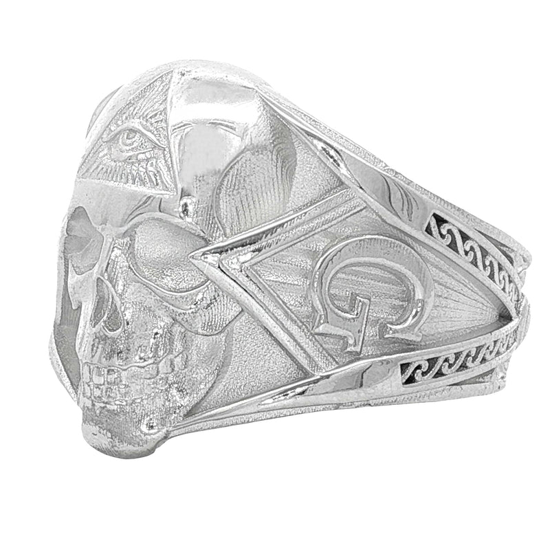 Silver skull ring with all-seeing eye pyramid and geometric details, matte finish.