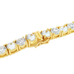Yellow gold tennis chain with alternating upside down round diamonds.