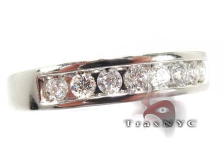 White gold men's ring with channel-set round diamonds in polished octostone design