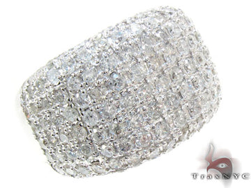 Wide white gold ring with nine rows of small sparkling diamonds in a pave setting.