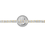 Yellow gold tennis chain with alternating upside down round diamonds.