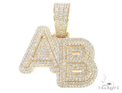 Custom diamond shadow pendant in 18k yellow gold – prong-set round diamonds, front angle showing dimensional profile