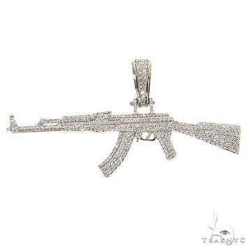 Diamond-encrusted AK-47 pendant in sparkling white gold with detailed gun design.
