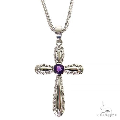 Silver cross pendant with intricate details and round purple amethyst center stone on chain