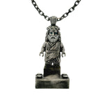 Silver TraxNYC Jesus pendant with blue diamond eyes on anchor cable chain.