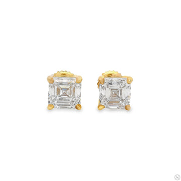 Yellow gold Asscher cut diamond stud earrings with four-prong setting.