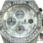 Audemars Piguet Royal Oak men's watch with diamond bezel and silver chronograph dial.