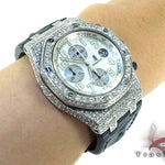 Audemars Piguet Royal Oak men's watch with diamond bezel and silver chronograph dial.