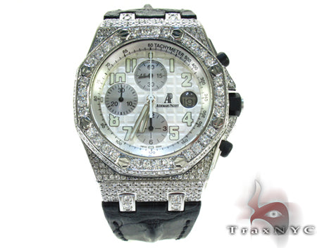 Audemars Piguet Royal Oak men's watch with diamond bezel and silver chronograph dial.