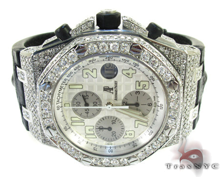 Audemars Piguet Royal Oak men's watch with diamond bezel and silver chronograph dial.