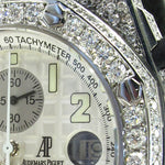 Audemars Piguet Royal Oak men's watch with diamond bezel and silver chronograph dial.