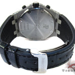 Audemars Piguet Royal Oak men's watch with diamond bezel and silver chronograph dial.