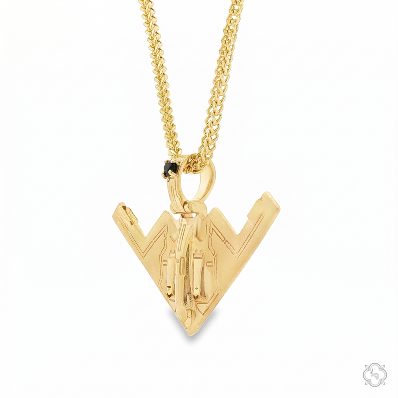 Gold B-2 bomber pendant with black diamond accent on gold chain necklace.
