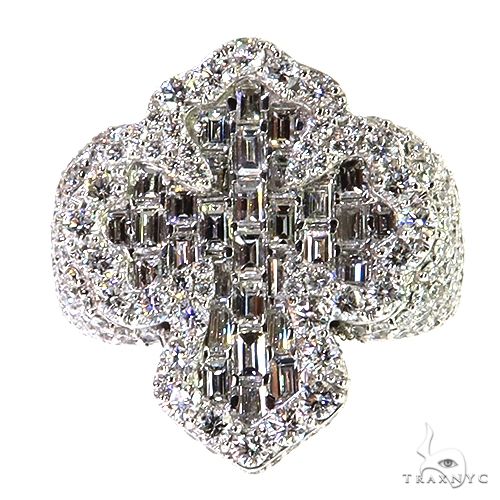 White gold baguette diamond cross ring with round diamond halo and detailed band