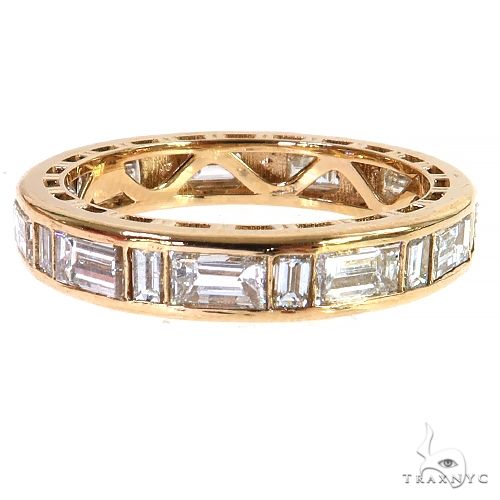 Yellow gold baguette diamond eternity wedding band with rectangular stones in channel setting