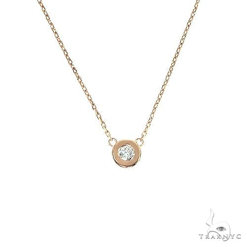 Bezel diamond necklace in 14k rose gold – round-cut stones set flush in continuous bezel row, front view