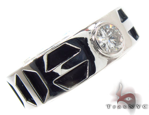 Men's pinky ring with a bezel-set round diamond and black geometric enamel accents