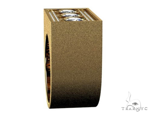 Yellow gold pinky ring with three bezel-set diamonds and pavé diamond accents