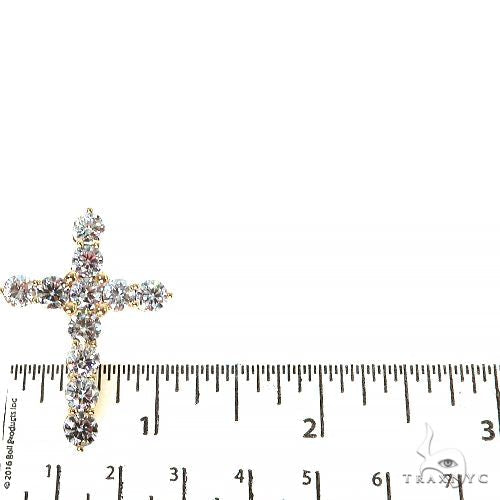 White gold diamond cross pendant with round brilliant 50-pointer diamonds, measuring 1.5 inches tall
