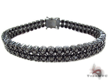 Men's black gold bracelet with prong-set round black diamonds