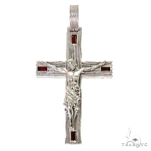 Silver cross pendant with red blood moon gemstones and detailed crucifix design
