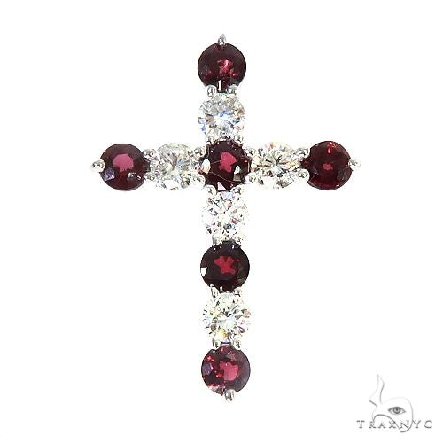 Blood red sapphire and diamond cross pendant with white gold setting