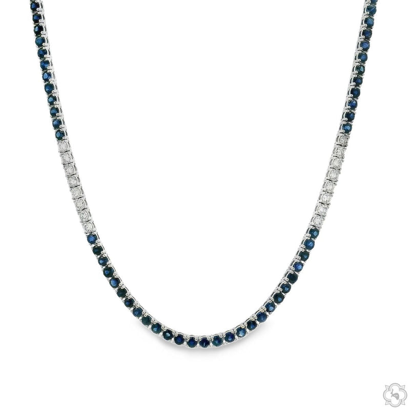 Blue sapphire and diamond gradient tennis necklace in white gold — full front view showing color fade from sapphires to diamonds