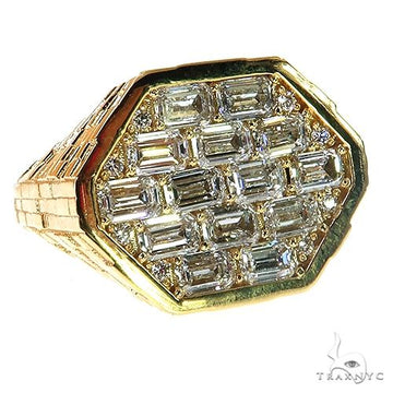 Yellow gold hexagon ring with baguette diamond pattern and brick-style band.