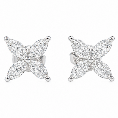 Silver butterfly-shaped diamond stud earrings with marquise-cut stones.