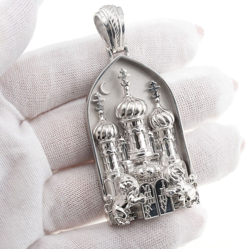 Large silver Cathedral of Light pendant with detailed domes and arch design.