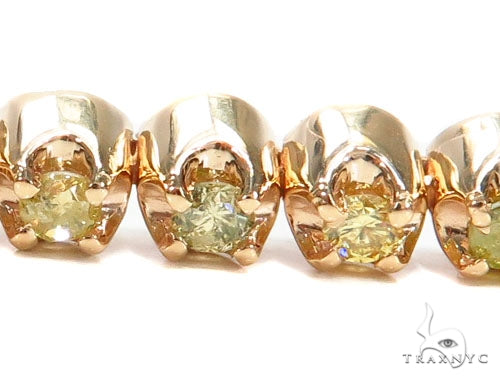 Rose gold bracelet with round yellow diamonds in a classic tennis setting