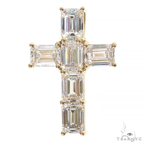 Yellow gold cross pendant with emerald-cut diamonds in a classic symmetrical design