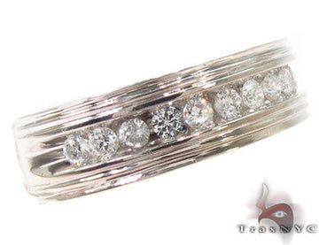 White gold men's wedding band with seven channel-set round diamonds