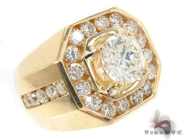Yellow gold men's octagonal ring with central diamond and surrounding smaller stones