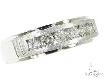 White gold men's wedding band with channel-set princess cut diamonds