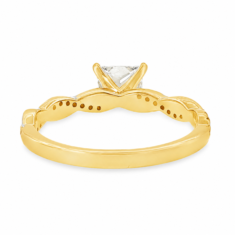 Yellow gold engagement ring with princess cut diamond center and delicate scalloped band.