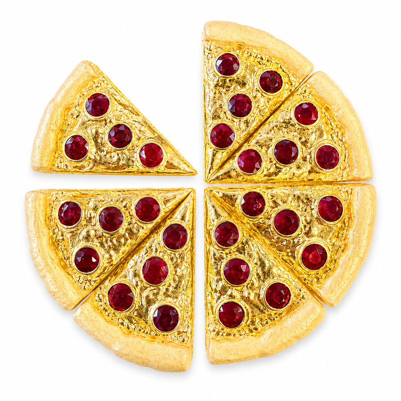 Yellow gold pendant shaped like a pizza pie with eight detachable slices and red gemstone toppings.