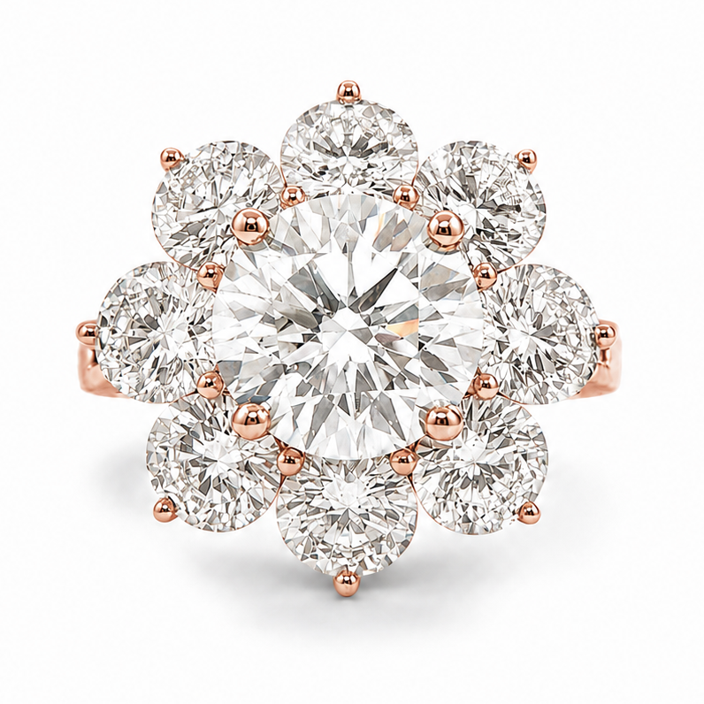 Rose gold ring with a large round diamond center surrounded by eight smaller diamonds in floral cluster.