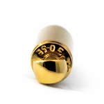 Gold bullet-shaped pendant with pink tip and polished finish.