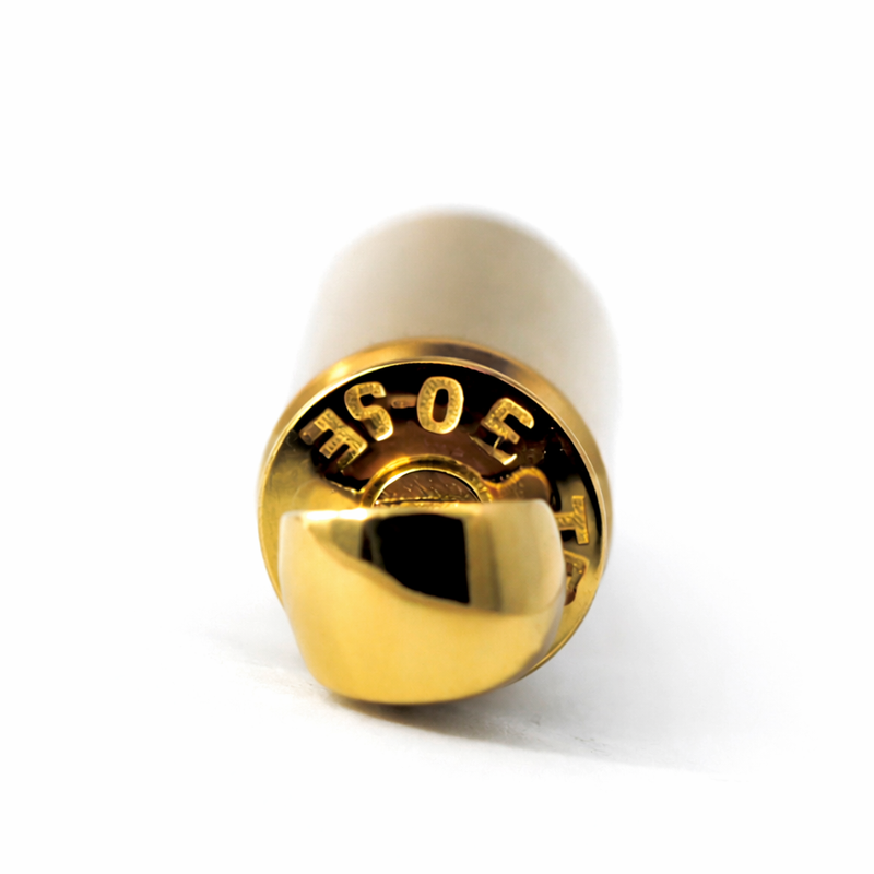 Gold bullet-shaped pendant with pink tip and polished finish.