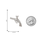 .925 silver revolver pendant with detailed grip and barrel, next to US quarter for size comparison.