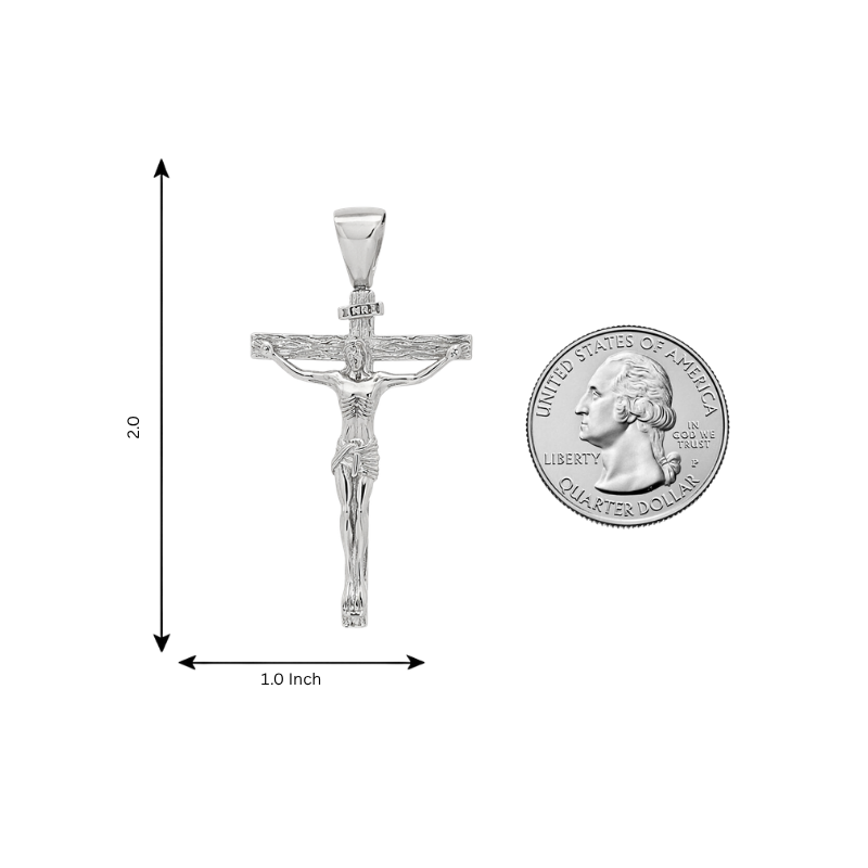 Sterling silver crucifix pendant with detailed Jesus figure, next to US quarter for scale.
