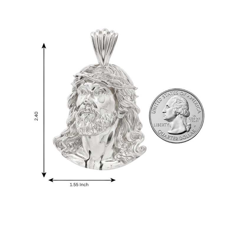 925 silver Jesus head pendant with detailed crown of thorns, next to quarter for size comparison.