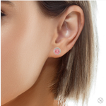Round pink center diamond stud earrings with white gold halo setting.